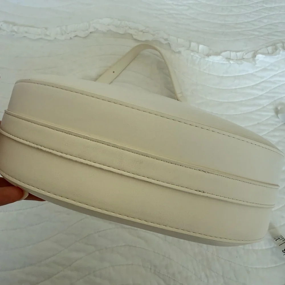 Minimal Cream Crescent Shoulder Bag with Gold Accent - Picture 2 of 6